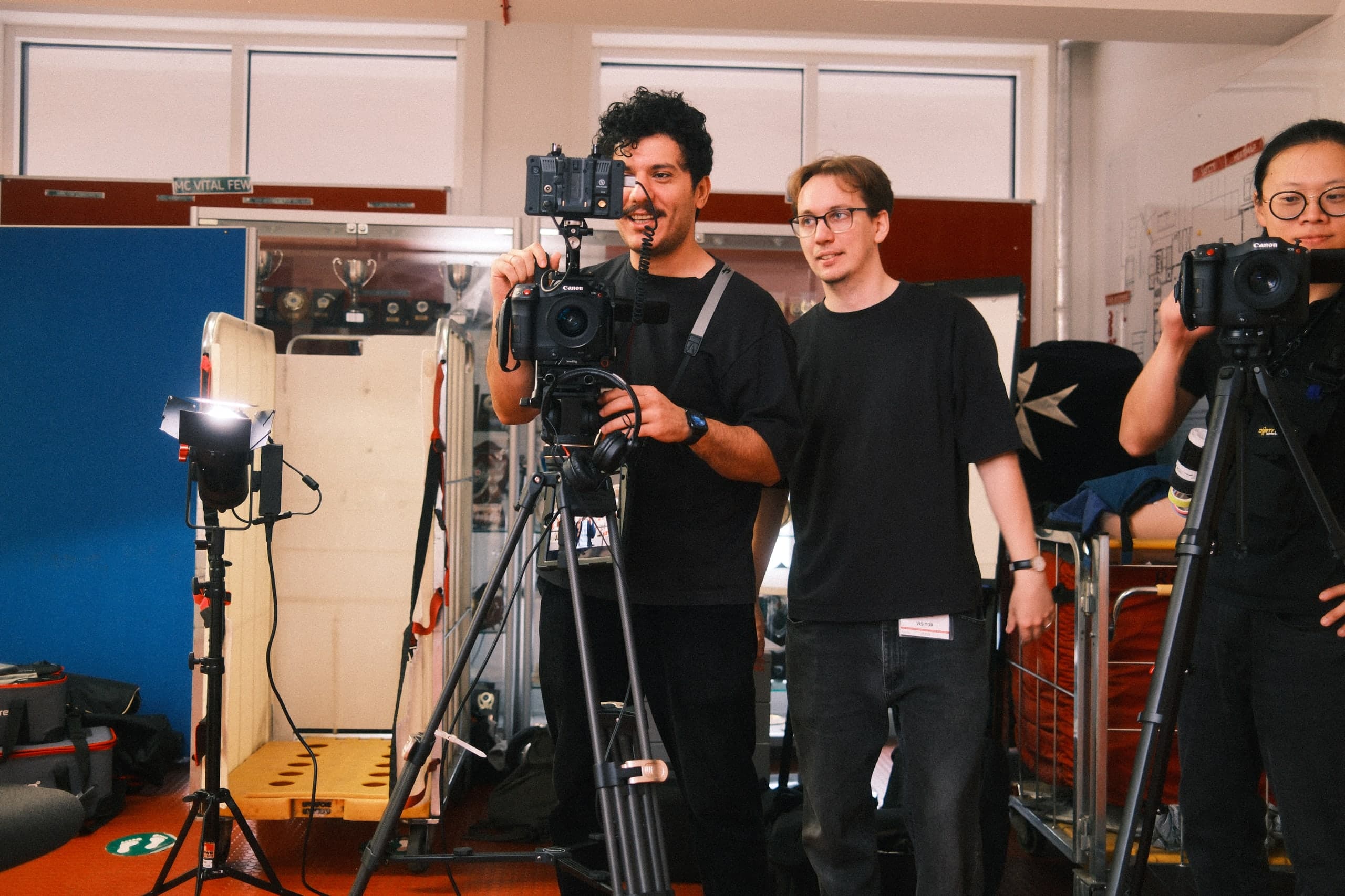The crew with camera and lights on a location shoot