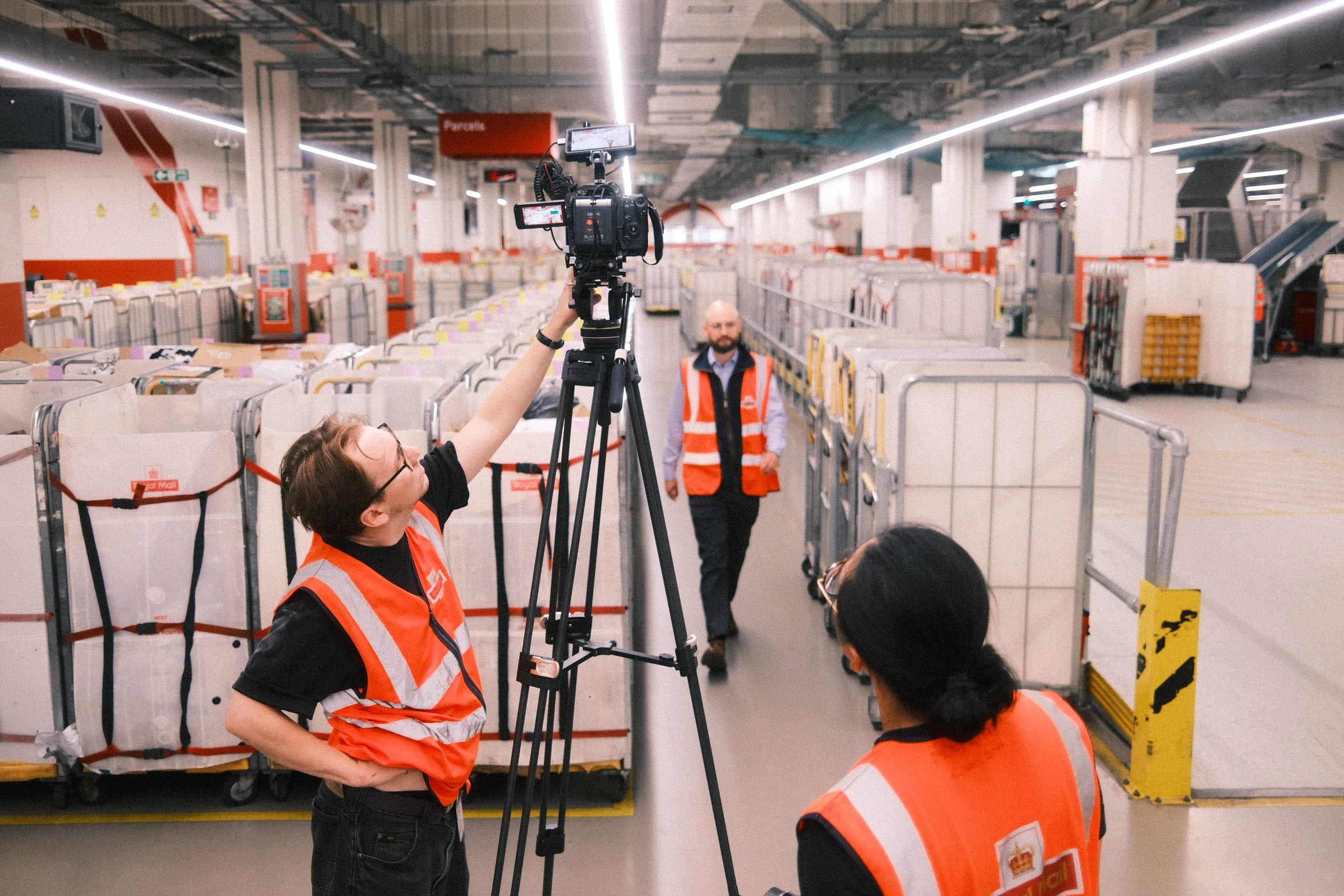 Lining up a shot among the crates of a warehouse